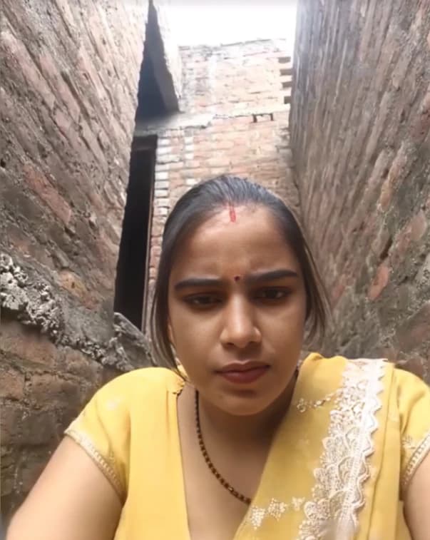 Desi Village Bhabhi MMS Video Stripping Boobs Out of Blouse and Milking Them and Fingering Her Pussy - Image 1